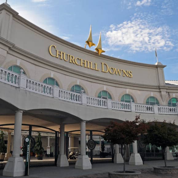 Exterior view of Churchill Downs with signature twin spires in Louisville, KY – an iconic event venue featured in events by Michaelis Events, Top Event Planners in Louisville KY & Best Wedding Caterers.
