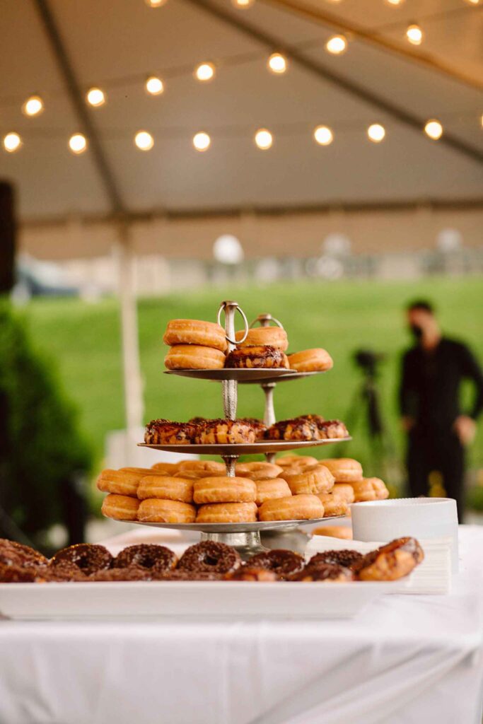 Donut tower dessert display by Michaelis Events, featuring assorted gourmet donuts for catering Louisville KY
