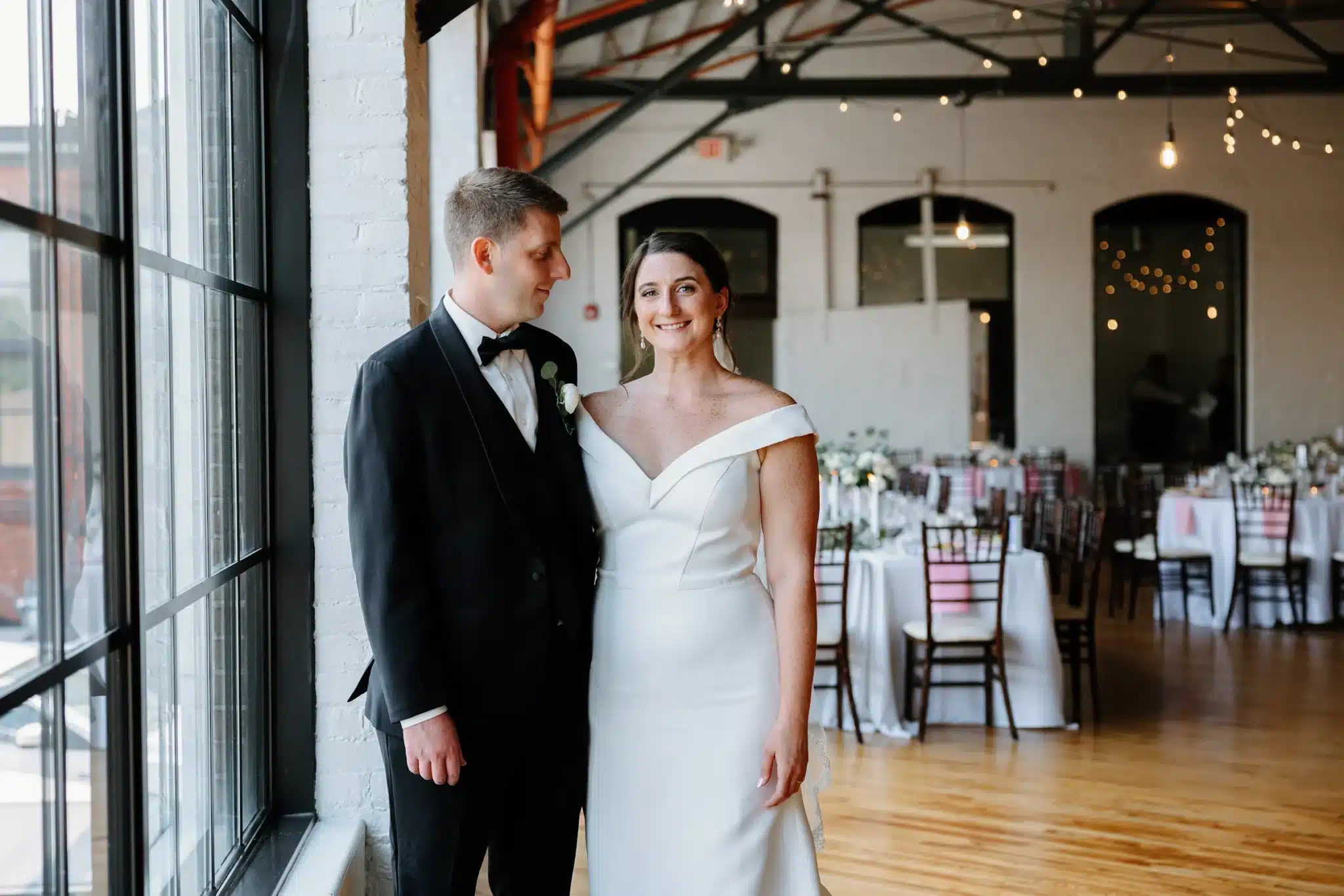 Bride and groom at The Pointe wedding venue in Louisville, coordinated by Michaelis Events, a Louisville wedding planning and catering expert