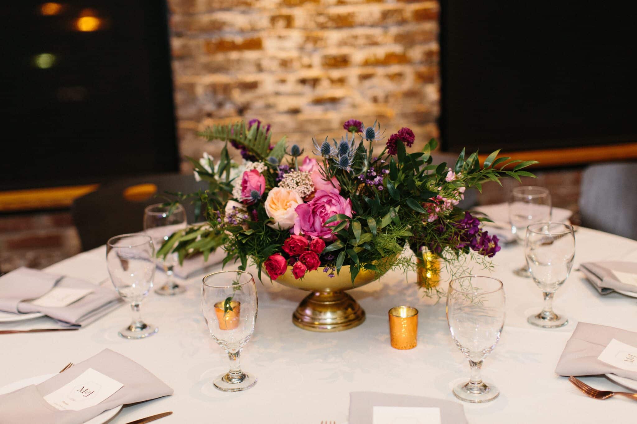 Elegant fall wedding centerpiece with lush florals by Michaelis Events, Louisville wedding planner, at a top Louisville wedding venue