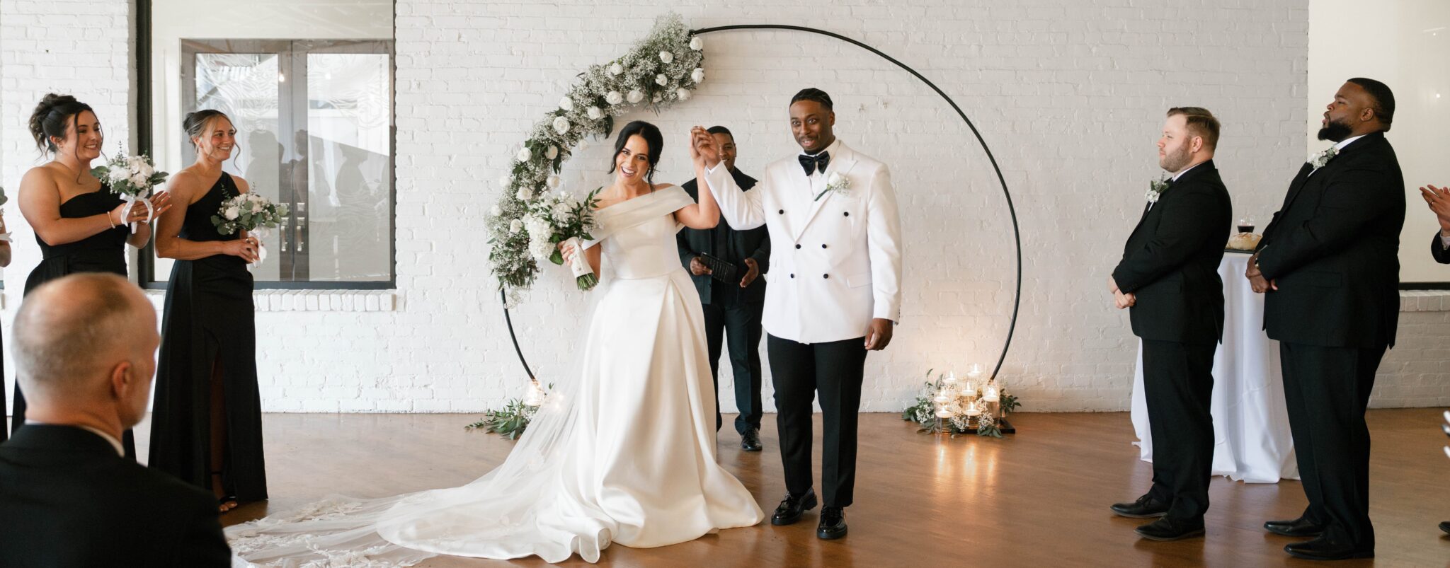 Bride and groom celebrating at The Pointe venue, coordinated by Michaelis Events, a Louisville wedding planner in KY